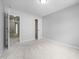 Empty bedroom with neutral carpet, gray walls, and white trim at 2459 Memory Ridge Dr, Raleigh, NC 27606