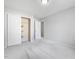 Carpeted bedroom features a closet, neutral paint, and a window for natural light at 2459 Memory Ridge Dr, Raleigh, NC 27606