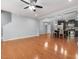 Spacious living room with hardwood floors and view into the kitchen at 2459 Memory Ridge Dr, Raleigh, NC 27606