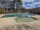 Stunning community pool featuring a pristine swimming area, splash pool, lakeside views, and comfortable lounging for residents at 2459 Memory Ridge Dr, Raleigh, NC 27606