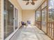 Relaxing screened-in porch offers comfortable seating and views of the backyard at 2459 Memory Ridge Dr, Raleigh, NC 27606