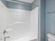 A pristine, white shower with brushed nickel fixtures adds a touch of luxury at 2459 Memory Ridge Dr, Raleigh, NC 27606