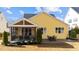 The home features a relaxing screened-in porch and patio area for entertaining at 2500 Plowridge Rd, Fuquay Varina, NC 27526