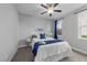 Charming bedroom featuring carpeted floors, and a ceiling fan, providing a comfortable space at 2500 Plowridge Rd, Fuquay Varina, NC 27526