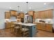 Spacious kitchen with ample cabinetry, a center island, and modern appliances at 287 Beacon Dr, Pittsboro, NC 27312