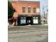 Storefront of a Vino Wine Shop with a modern black facade and large display windows at 287 Beacon Dr, Pittsboro, NC 27312