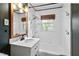 Well-lit bathroom with vanity, tile, and shower at 303 Granville Rd, Chapel Hill, NC 27514