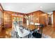 Stylish dining area with hardwood floors, a modern table, chairs, and great natural light at 303 Granville Rd, Chapel Hill, NC 27514