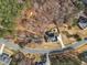 Overhead angle shows a well-maintained property in wooded neighborhood, close to neighborhood shopping and businesses at 330 Bridgeport Cir, Clayton, NC 27527