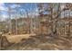 Wooded backyard has ample privacy and mature shade trees for a relaxing vibe at 330 Bridgeport Cir, Clayton, NC 27527