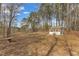 Spacious backyard with storage shed and small bench, great for relaxing at 330 Bridgeport Cir, Clayton, NC 27527
