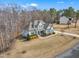 A beautiful home boasts a well-kept lawn, manicured landscaping, and inviting front porch at 330 Bridgeport Cir, Clayton, NC 27527