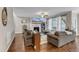 Inviting living room with a fireplace, TV, and large windows for ample natural light at 330 Bridgeport Cir, Clayton, NC 27527