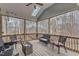 Relaxing screened porch featuring comfortable seating, scenic views and a skylight at 330 Bridgeport Cir, Clayton, NC 27527