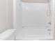 Bathroom showing a white shower and tub combination at 3429 Dogwood Dr, Raleigh, NC 27604