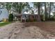 Charming brick ranch with covered parking and front yard at 3429 Dogwood Dr, Raleigh, NC 27604