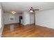 Open living room featuring hardwood floors and neutral color palette at 3429 Dogwood Dr, Raleigh, NC 27604