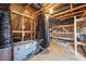 Unfinished attic space showing beams, wooden framing and ductwork, ready to be finished at 345 Springtime Fields Ln, Wake Forest, NC 27587