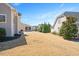 Spacious backyard with a patio and manicured lawn, provides a tranquil outdoor retreat at 345 Springtime Fields Ln, Wake Forest, NC 27587