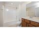 Bathroom featuring a combination tub and shower unit, nice vanity, and tile flooring at 345 Springtime Fields Ln, Wake Forest, NC 27587