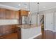 Well-appointed kitchen with granite counters, stainless appliances, and ample cabinet space at 345 Springtime Fields Ln, Wake Forest, NC 27587