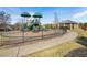 Community playground features two play structures, swings, and a covered gazebo for parents at 345 Springtime Fields Ln, Wake Forest, NC 27587