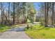 Paved walking trail winds through a wooded area, inviting exploration and relaxation at 345 Springtime Fields Ln, Wake Forest, NC 27587