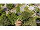 Aerial view of a home with mature trees and cul-de-sac location at 3624 Singleleaf Ln, Raleigh, NC 27616