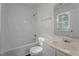 Bathroom boasts tub and shower, plus a white vanity and toilet at 3624 Singleleaf Ln, Raleigh, NC 27616