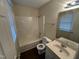 Bathroom featuring a tub and shower combination, toilet, and vanity with sink at 3624 Singleleaf Ln, Raleigh, NC 27616