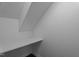 Storage closet with desk and white walls under angled roof at 3624 Singleleaf Ln, Raleigh, NC 27616