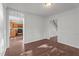 Cozy dining room with hardwood floors adjacent to an updated kitchen featuring modern appliances at 3624 Singleleaf Ln, Raleigh, NC 27616