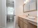 Functional bathroom features a sink, a toilet, and a walk-in shower, all designed with practicality in mind at 4617 Atterbury Ct, Raleigh, NC 27604