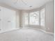 Bedroom featuring neutral paint, carpet and bright bay windows at 4617 Atterbury Ct, Raleigh, NC 27604