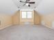 Large bonus room with multiple windows, neutral carpet, and recessed lighting providing an open and inviting space at 4617 Atterbury Ct, Raleigh, NC 27604