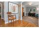 Inviting foyer with hardwood floors, stylish decor, and an open view to the living area at 4617 Atterbury Ct, Raleigh, NC 27604