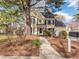 Inviting two-story home with a welcoming walkway and a well-maintained front yard at 4617 Atterbury Ct, Raleigh, NC 27604