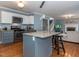 Well-equipped kitchen with granite counters and open layout, adjacent to the living area at 4617 Atterbury Ct, Raleigh, NC 27604