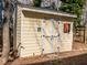 Backyard shed featuring light yellow paint and white trim at 4617 Atterbury Ct, Raleigh, NC 27604
