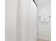 Clean, minimalist bathroom featuring a shower and neatly hung white towels at 4708 Sweetbriar Dr, Raleigh, NC 27609