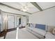 Spacious living room with beamed ceilings and a comfortable sectional sofa at 4708 Sweetbriar Dr, Raleigh, NC 27609