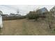 Large backyard featuring a wooden fence, providing privacy and a defined outdoor space for various activities at 4821 Heathshire Dr, Raleigh, NC 27616