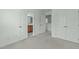 Bedroom featuring neutral carpeting and access to an ensuite bathroom and walk in closet at 4821 Heathshire Dr, Raleigh, NC 27616