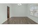 Bright dining area with hardwood floors and plenty of natural light at 4821 Heathshire Dr, Raleigh, NC 27616