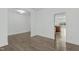 Bright dining area with hardwood floors, flowing into the kitchen at 4821 Heathshire Dr, Raleigh, NC 27616