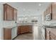 Spacious kitchen features stainless steel dishwasher and lots of cabinet space at 4821 Heathshire Dr, Raleigh, NC 27616