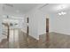 Spacious living area featuring hardwood floors and large windows at 4821 Heathshire Dr, Raleigh, NC 27616