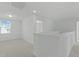 Second floor hallway with a bedroom and lots of natural light at 4821 Heathshire Dr, Raleigh, NC 27616