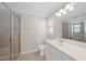 Bathroom featuring a glass shower, a white vanity and a large mirror at 500 Skygrove Dr, Holly Springs, NC 27540