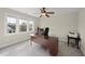 Office space with a large desk, a chair, and natural light at 500 Skygrove Dr, Holly Springs, NC 27540